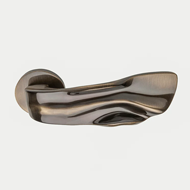 TWIRL Lever Handle on rose - Bronze Fin