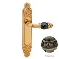 Door lever handles set on plates with S